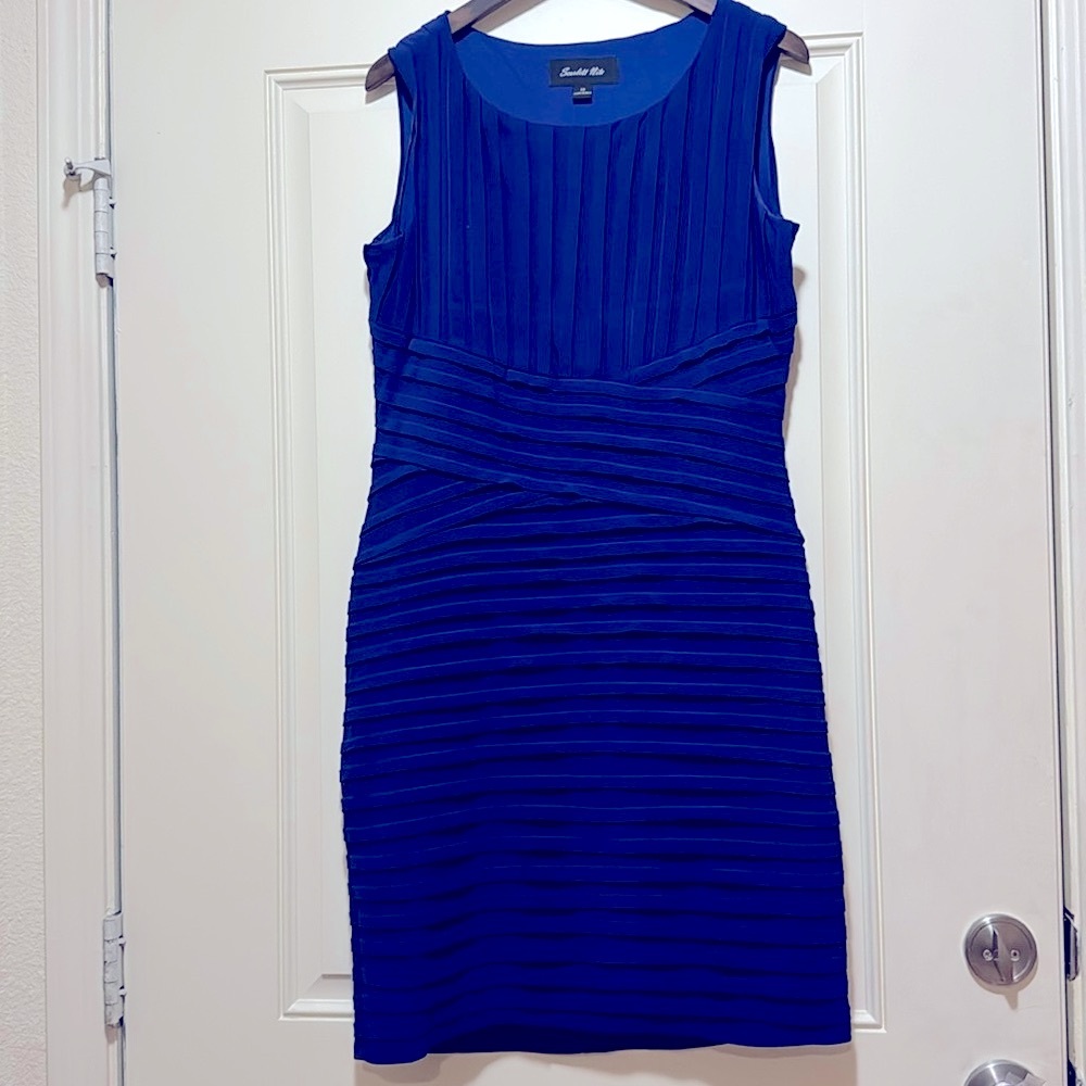 Brand Scarlett Nite , size 12, sleeveless royal blue, zip down the side.